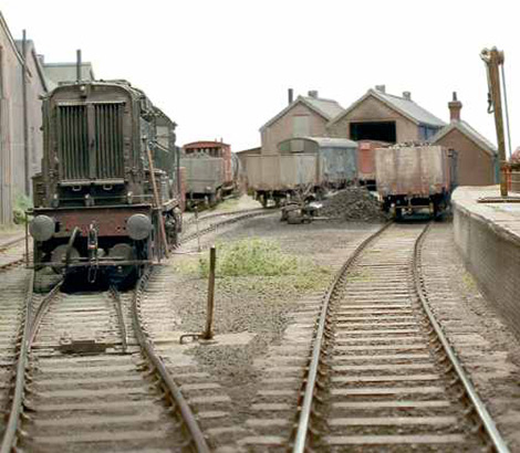 A scene from 'Napier Street' by Nigel Bowyer showing the intimate detail possible in 7mm scale. The entire layout is only 10'6" long.